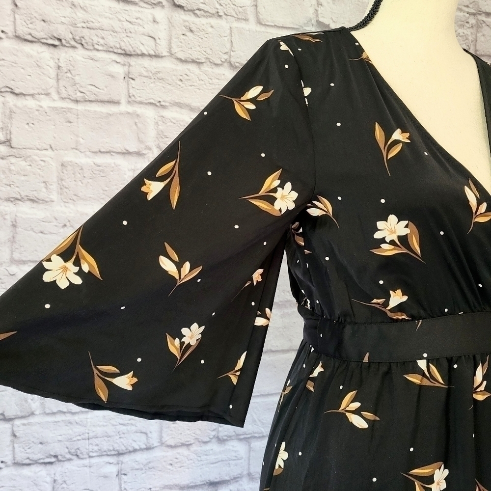 Saltwater Luxe black floral print wrap midi length ruffle hem 3/4 sleeve dress - Picture 6 of 11